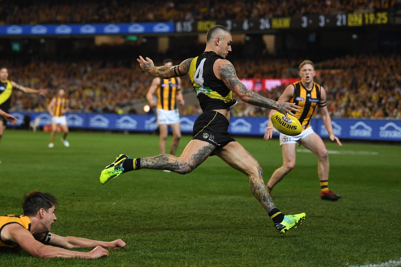 Richmond's Dustin Martin was best on ground in his 200th game. Photo: AAP/Julian Smith