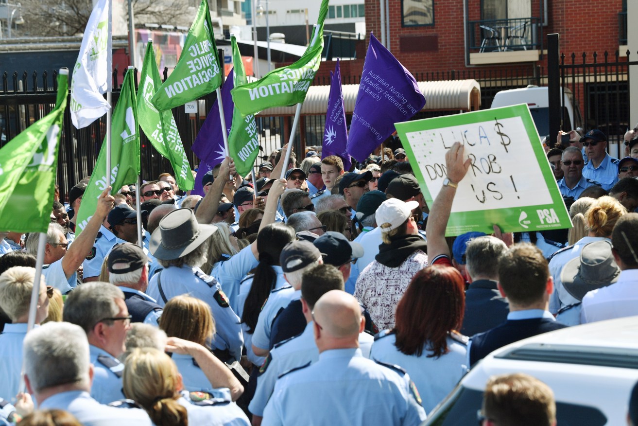 Protestors marched from the Remand Centre to Parliament House yesterday. Photo: David Mariuz / AAP