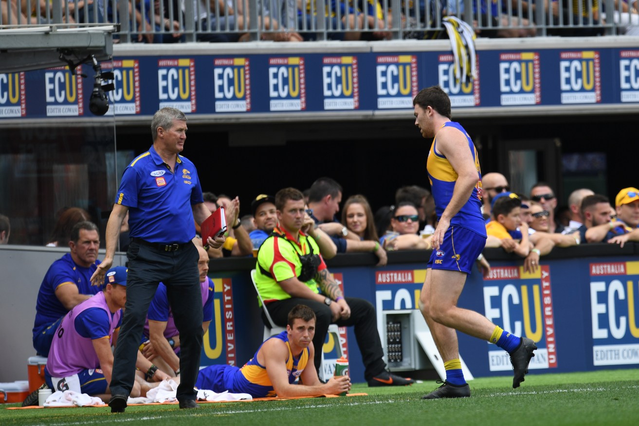 Jeremy McGovern after being injured against the Demons. Photo: AAP/Julian Smith