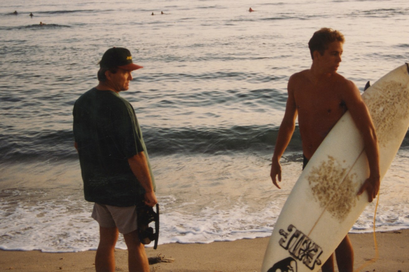 Paul Walker at the beach with his father.
