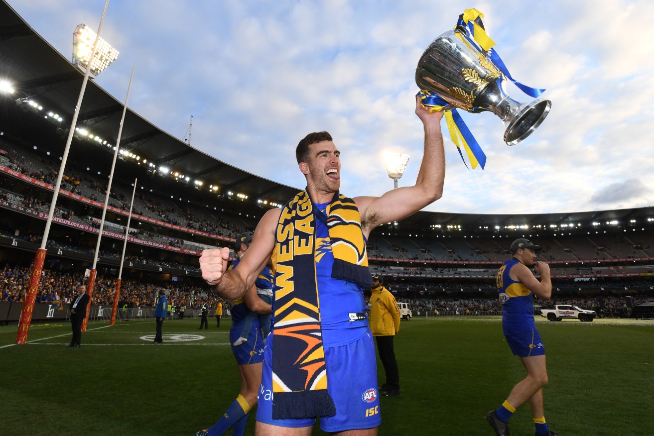Scott Lycett with the premiership cup - the grand final will be his last game for the Eagles. Photo: AAP/Julian Smith