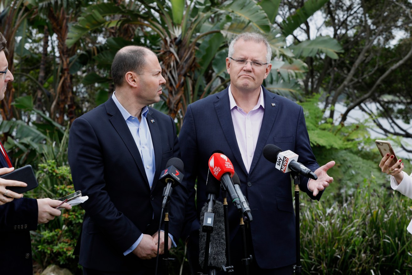 Prime Minister Scott Morrison and Treasurer Josh Frydenberg discus the Wentworth by-election in Sydney yesterday. Photo: AAP/Chris Pavlich