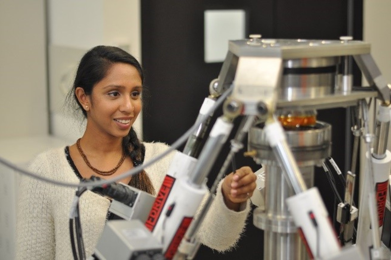Dhara Amin with the hexapod robot at Tonsley.
