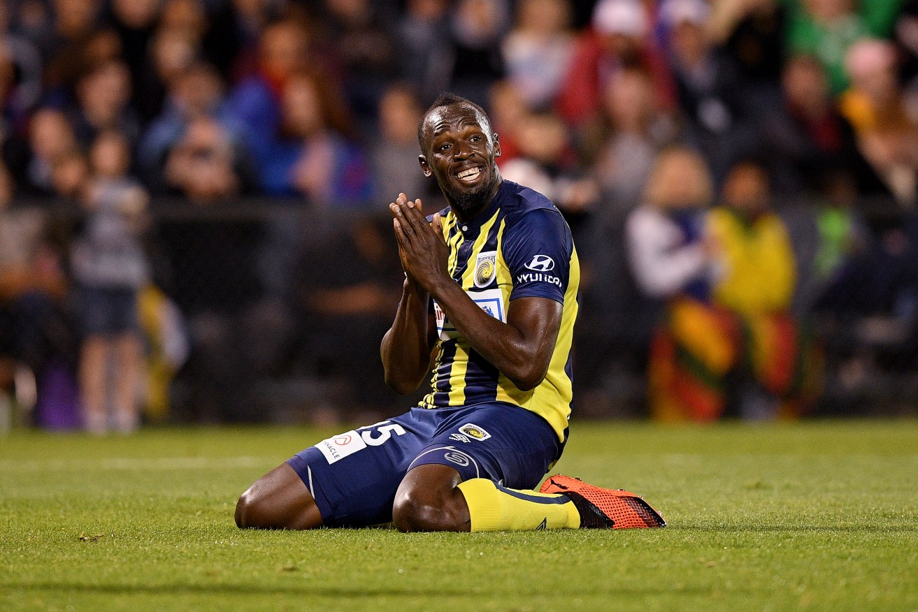 Usain Bolt during an A-League trial match. Photo: AAP/Dan Himbrechts