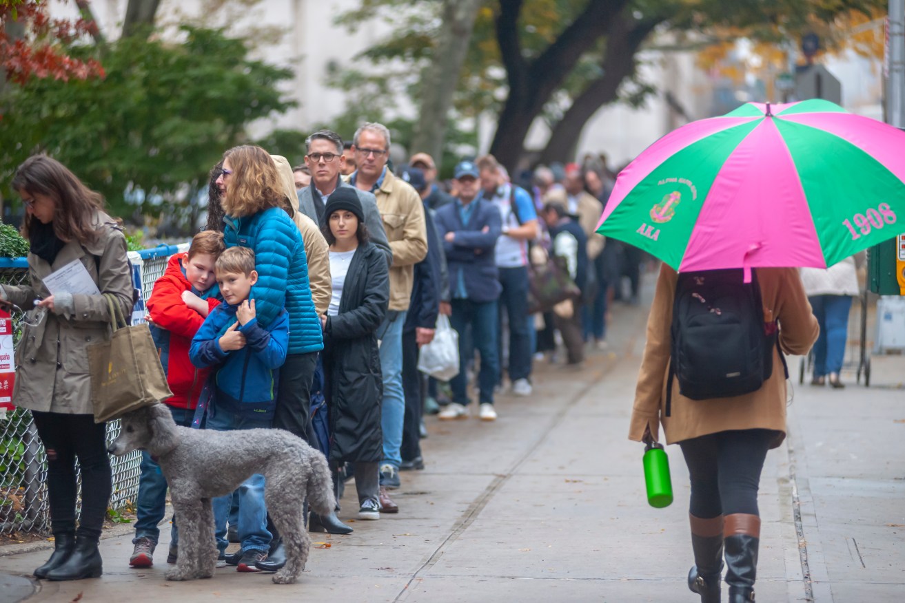 Hundreds of voters wait in line to enter a polling station in the Chelsea neighborhood of New York. Photo: Richard B. Levine