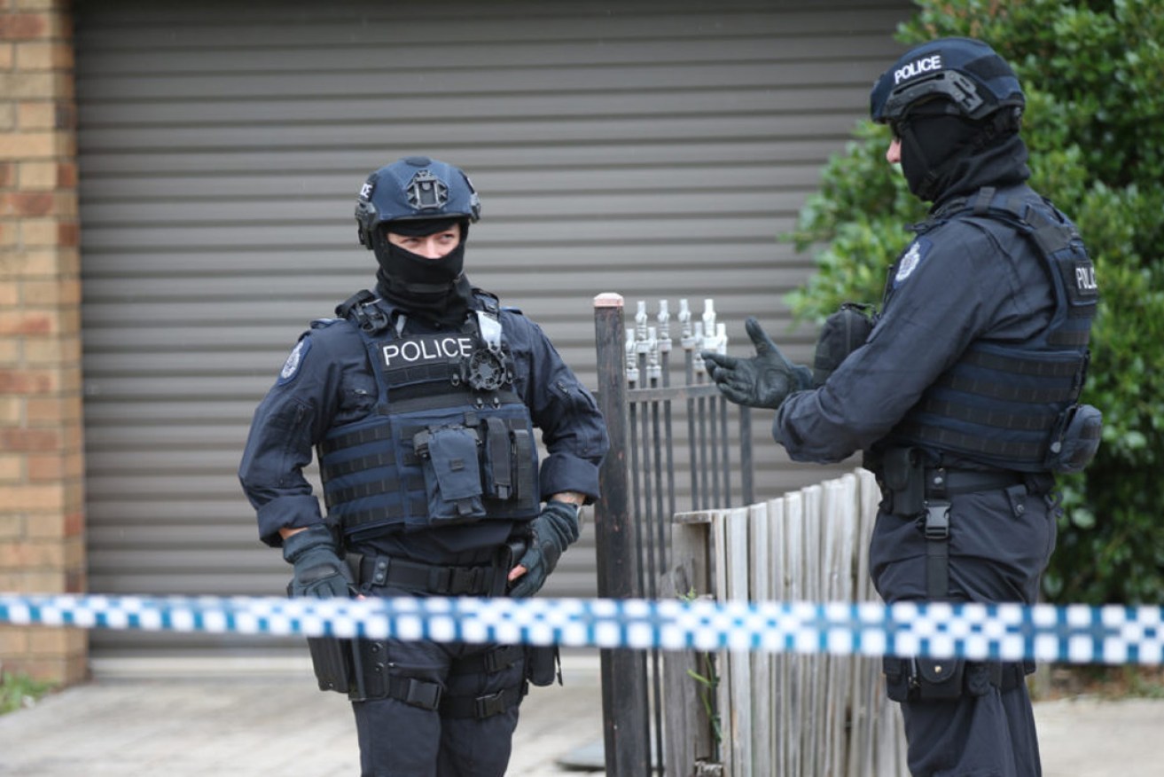 Police following the counter-terrorism raids. Photo: David Crosling / AAP 