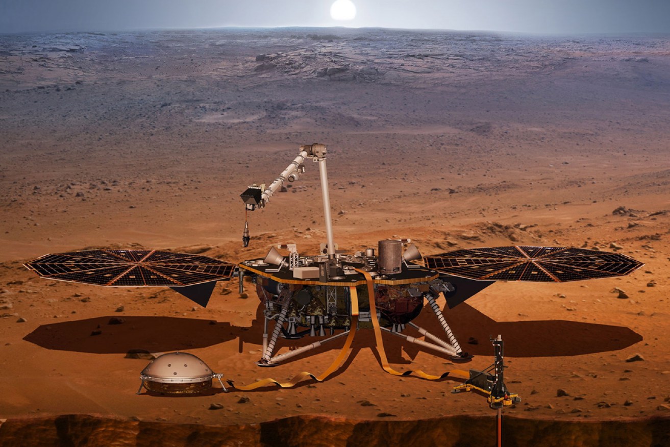 An artist's impression of NASA's InSight lander probing the 'Inner Space' of Mars. Photo: EPA
