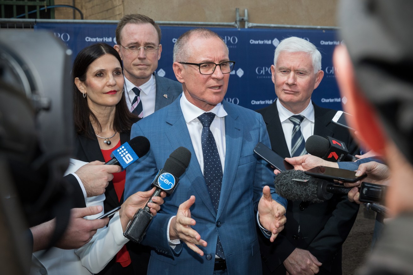 Jay Weatherill (centre) and John Rau (right) are retiring from parliament. Jo Chapley (left) is one name mooted to replace Rau in Enfield. Photo: Ben Macmahon / AAP