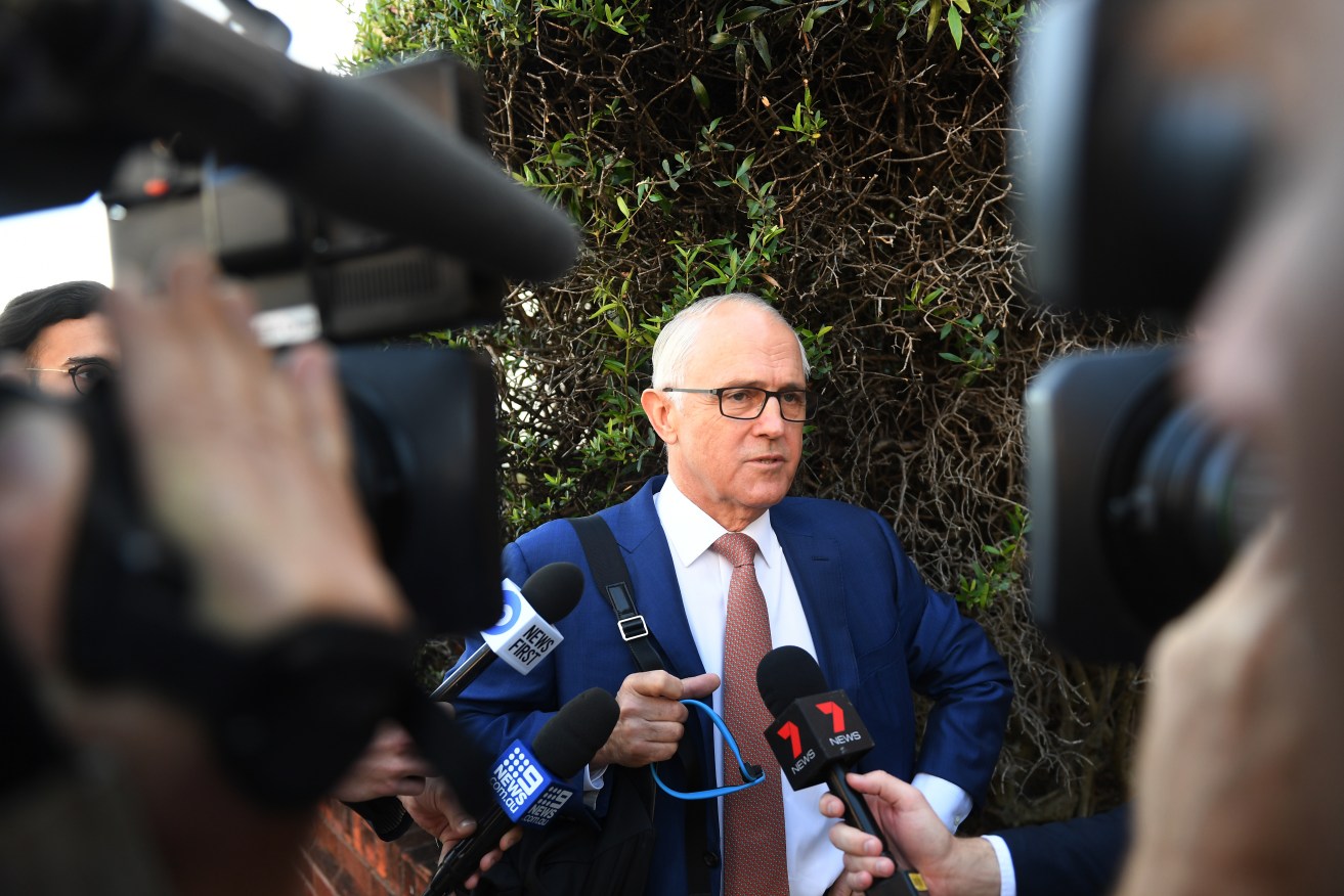Former prime minister Malcolm Turnbull speaks to the media outside his Sydney home today. Photo: AAP/Dean Lewins