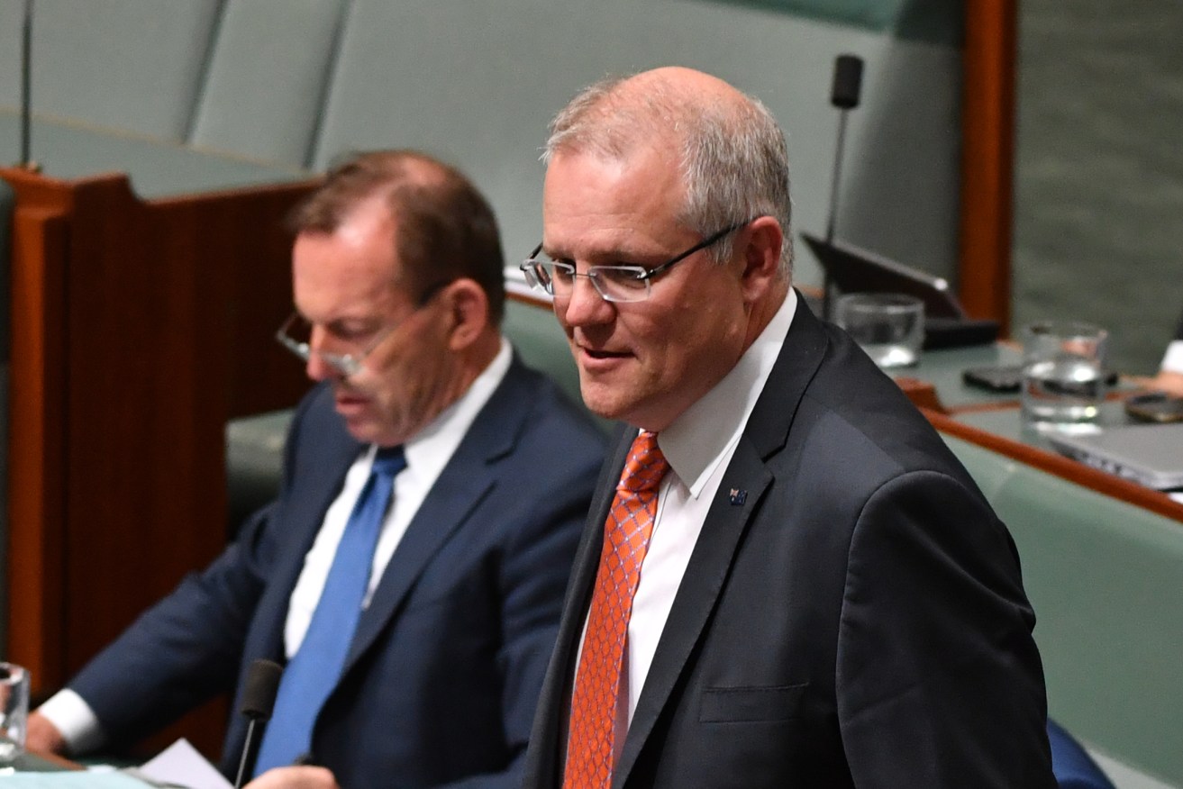 Former prime minister Tony Abbott and current leader Scott Morrison during Question Time yesterday. Photo: AAP/Mick Tsikas