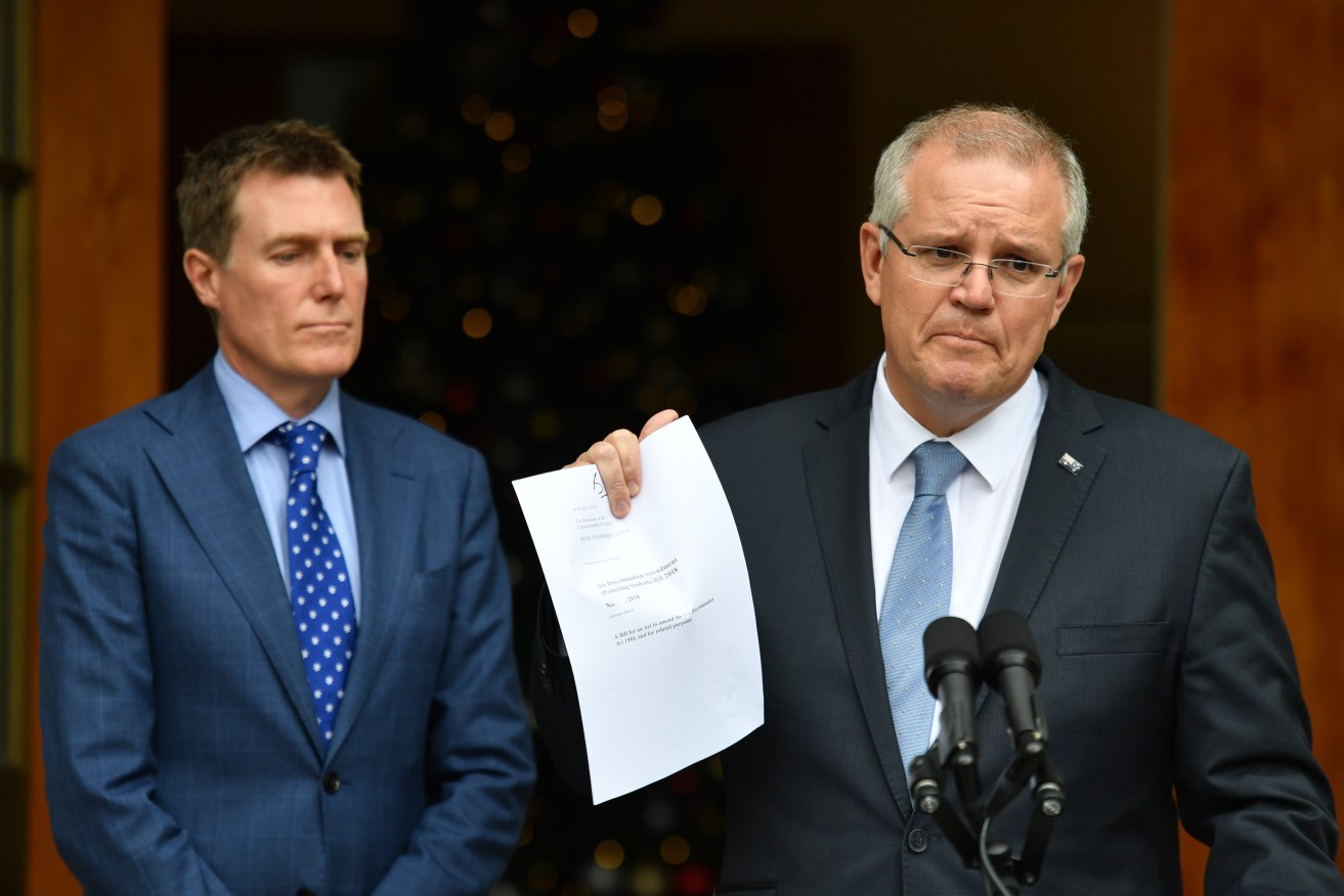 Prime Minister Scott Morrison (right) and Attorney-General Christian Porter speak on religious freedom and gay students today. Photo: AAP/Mick Tsikas