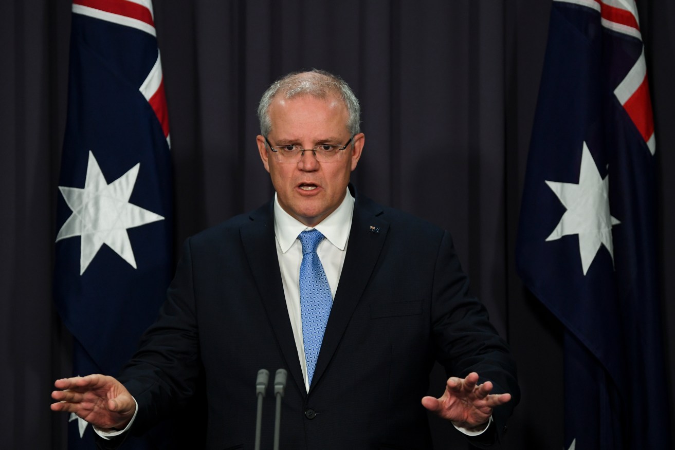 Prime Minister Scott Morrison will try to delay a vote to avoid a historic defeat. Photo: AAP/Lukas Coch