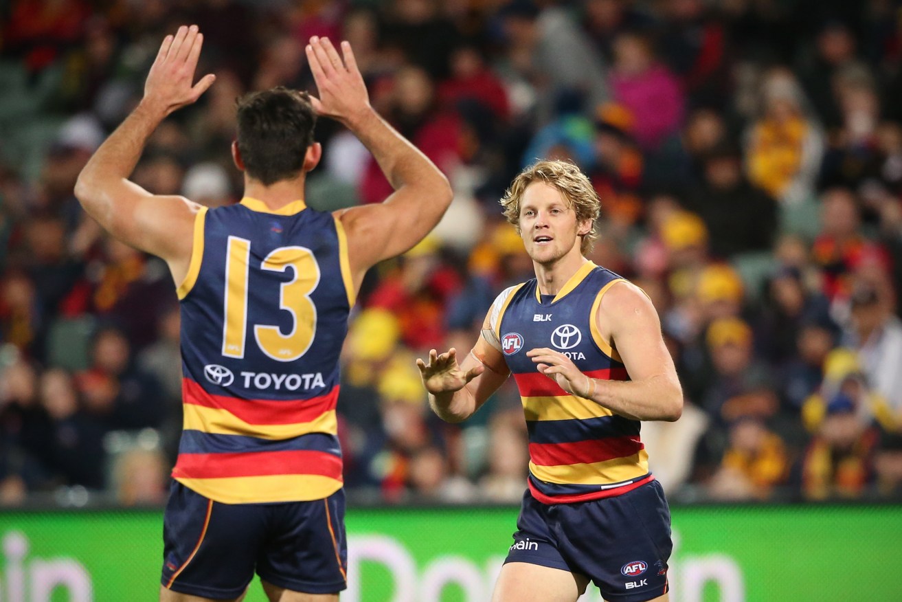 Rory Sloane (right) will join Taylor Walker as co-captain of the Adelaide Football Club. Photo: AAP/Ben Macmahon
