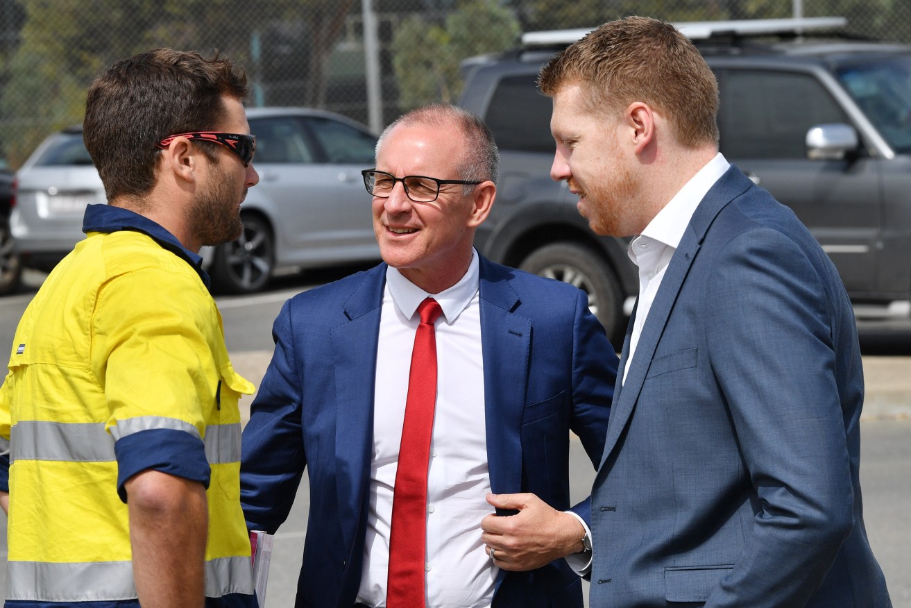 Labor candidate for Cheltenham Joe Szakacs (right) will not face a Liberal opponent in his bid to replace Jay Weatherill (centre). Photo: David Mariuz / AAP