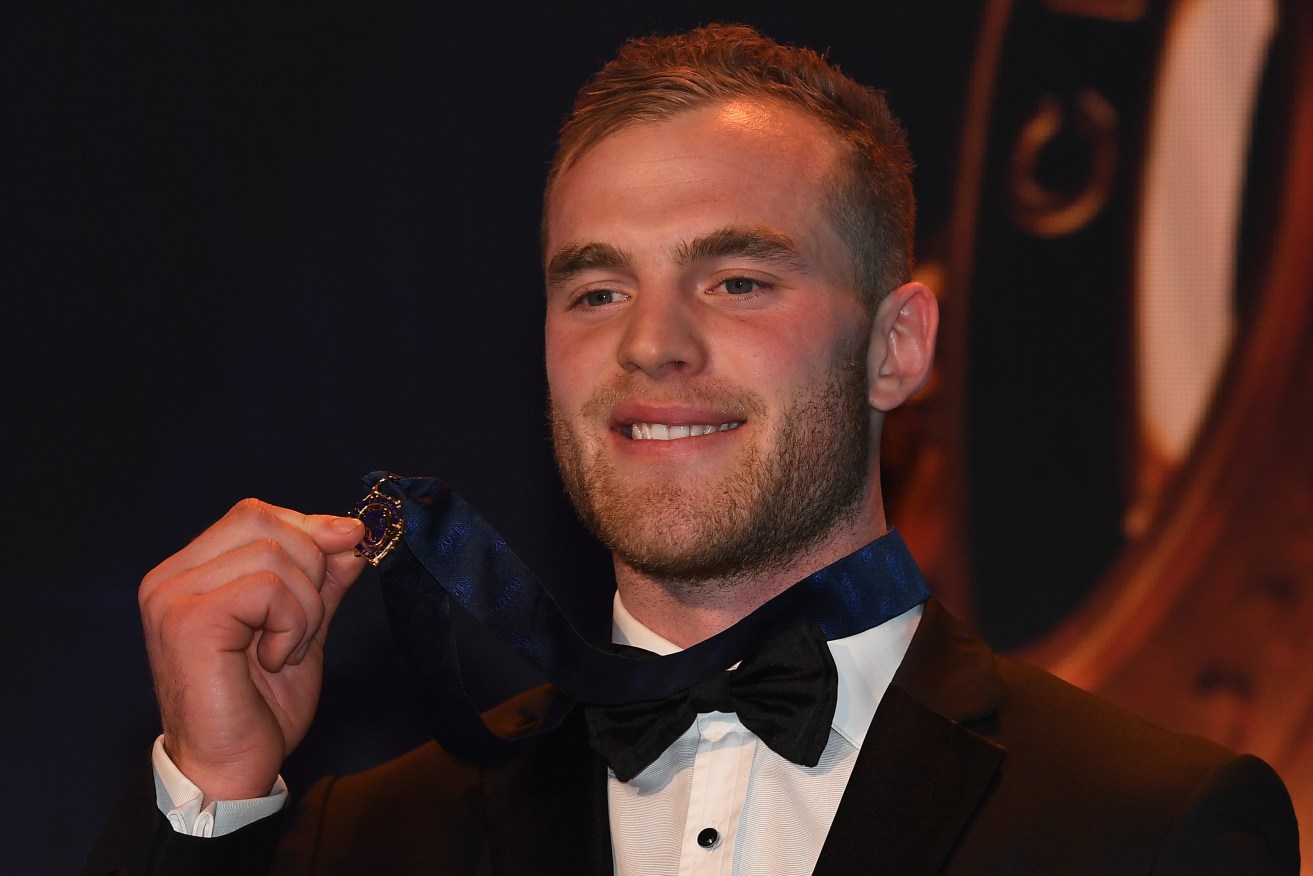 Tom Mitchell after winning last year's Brownlow Medal. Photo: AAP/Julian Smith