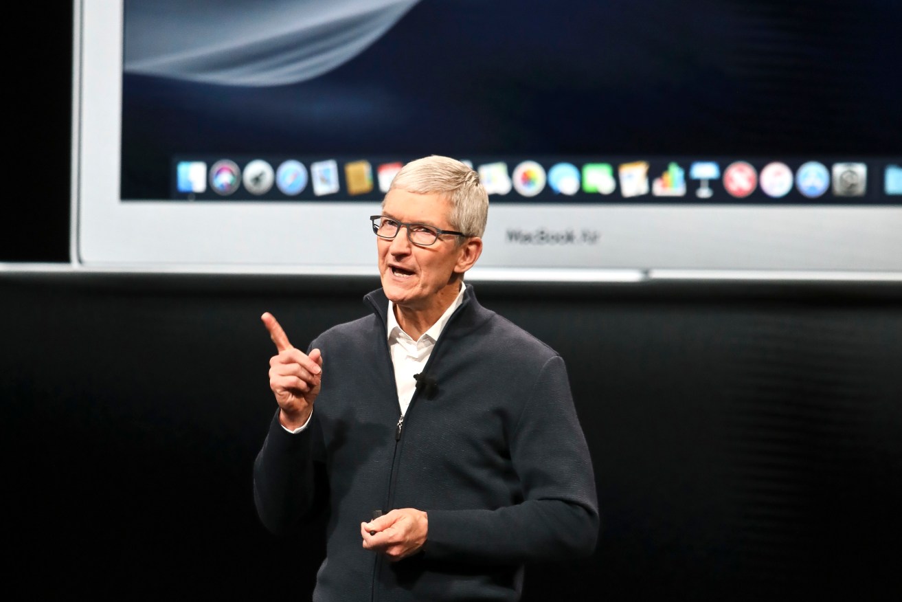 Apple CEO Tim Cook faces his biggest challenge since taking over from Steve Jobs. Photo: AP/Bebeto Matthews