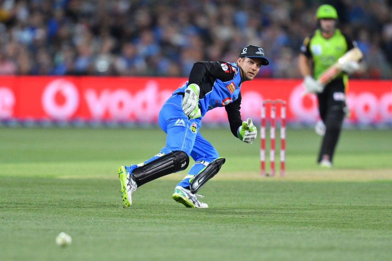 Alex Carey in action for the Adelaide Strikers in the BBL. Photo: AAP/David Mariuz