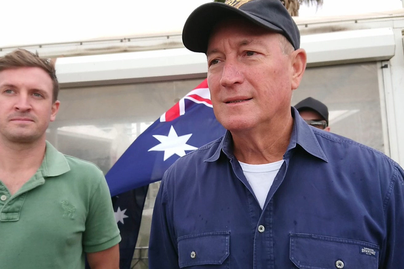 A supplied image of Independent Senator Fraser Anning attending Saturday's far-right-organised protest at St Kilda beach in Melbourne. Photo: Kenji Wardenclyffe / Wardenclyffe Photography via AAP