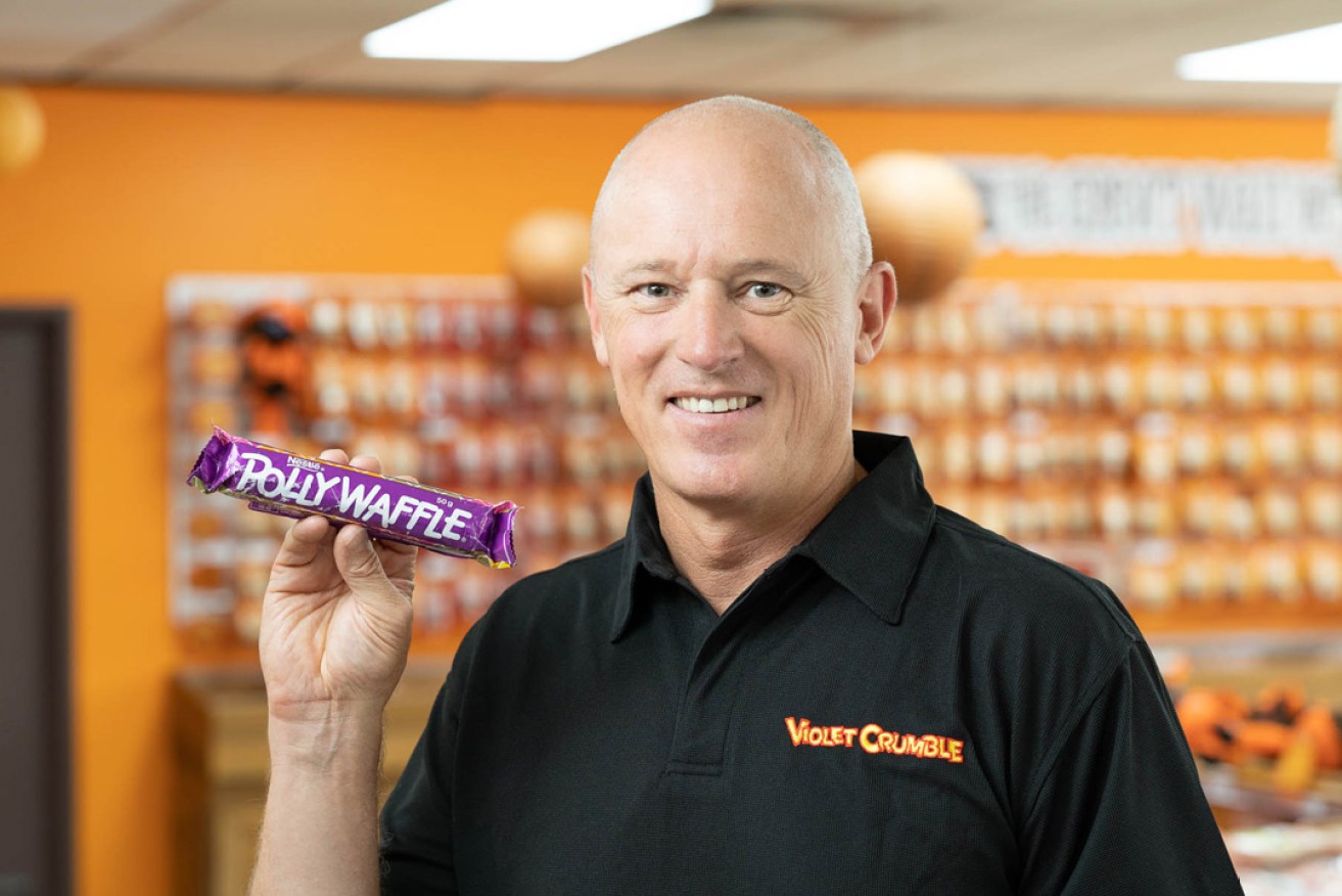 Robern Menz CEO Phil Sims with a Polly Waffle, now more than 10 years old, found among the equipment acquired from Nestlé alongside the Violet Crumble brand.