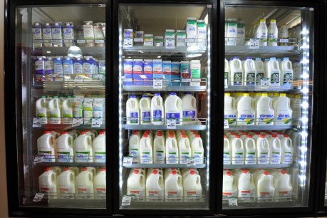 Woolworths axes $1 milk, claiming farmers will benefit