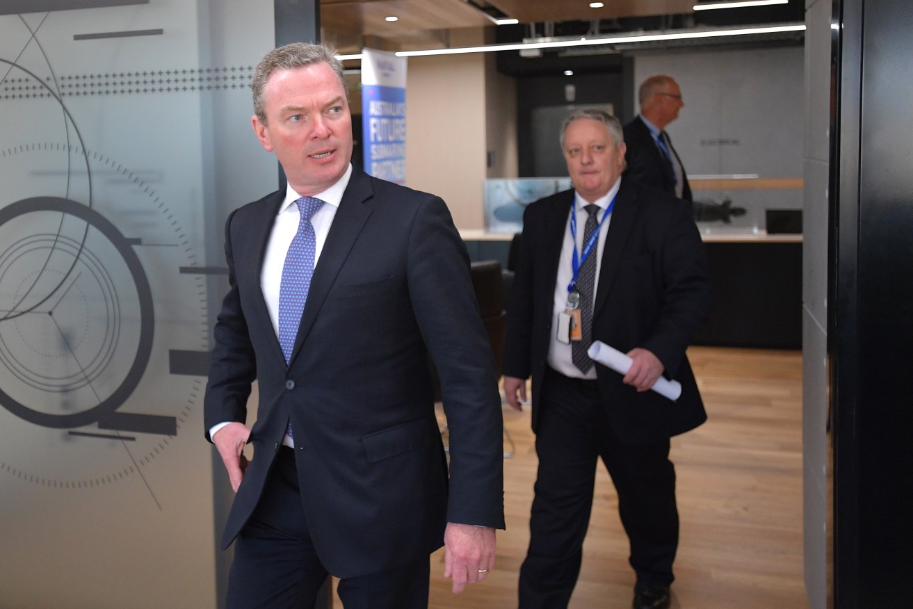 Christopher Pyne with Naval Group boss Herve Gilliou at the Naval Group Australia Office in Keswick in 2017. Photo: David Mariuz / AAP