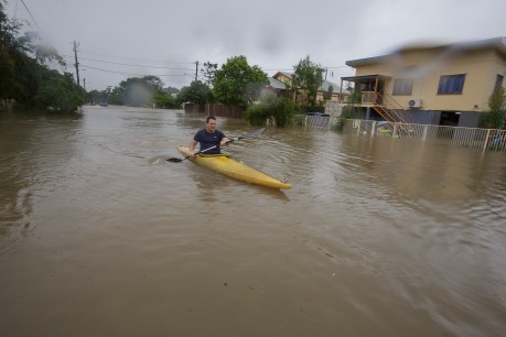 Scramble for boats in flood-hit Townsville