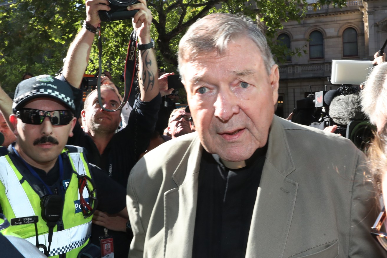 Prosecutors have dropped more than a dozen charges against reporters and media companies over their coverage of Cardinal George Pell's sex abuse convictions Photo: AAP/David Crosling