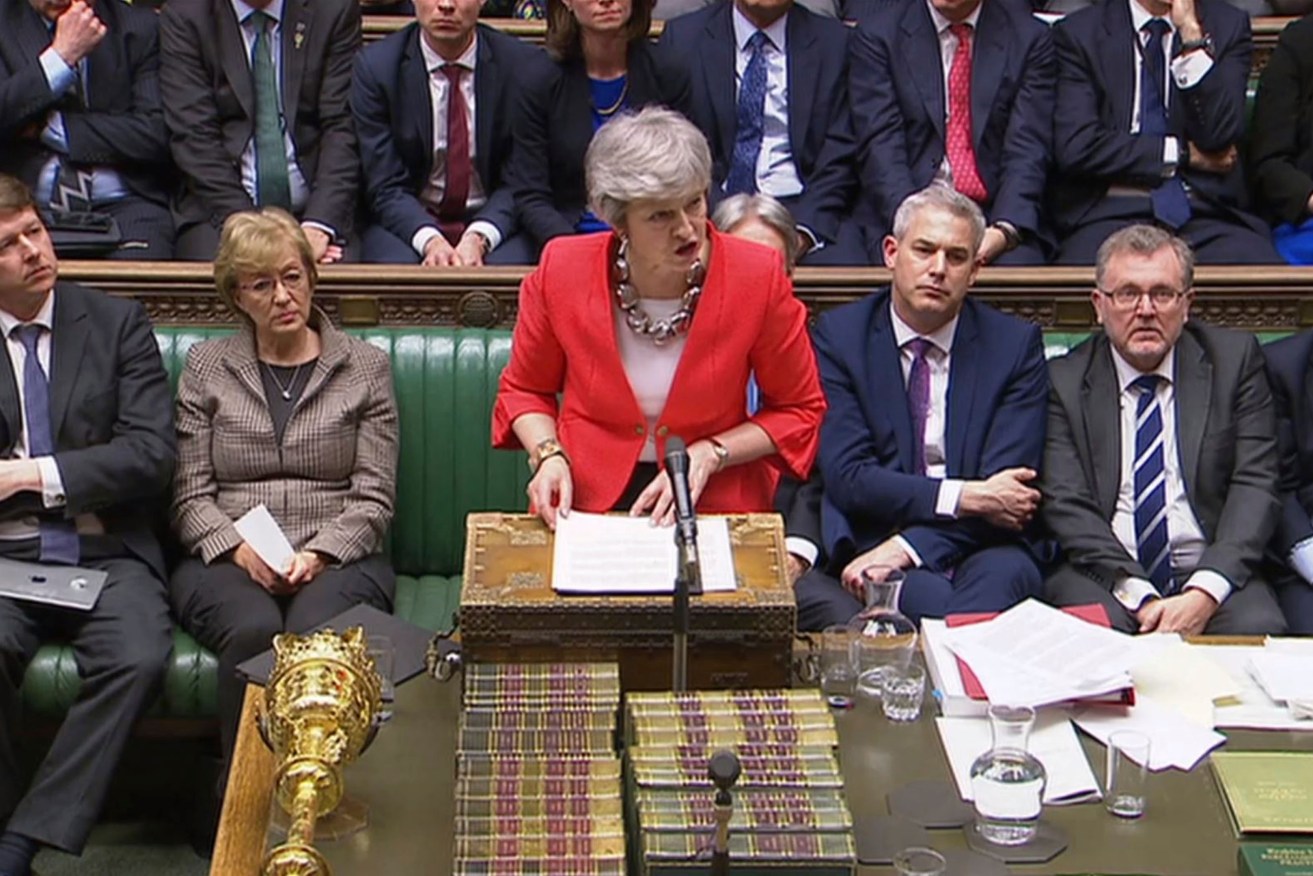 Britain's Prime Minister Theresa May speaks to lawmakers in parliament overnight. Photo: House of Commons/PA via AP