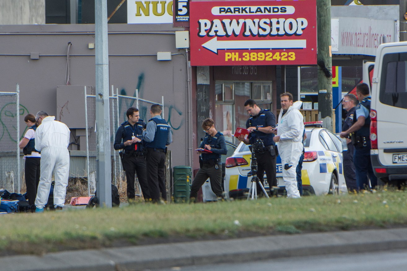 Police are seen at the Linwood Islamic Centre in Christchurch. Photo: David Alexander / via AAP
