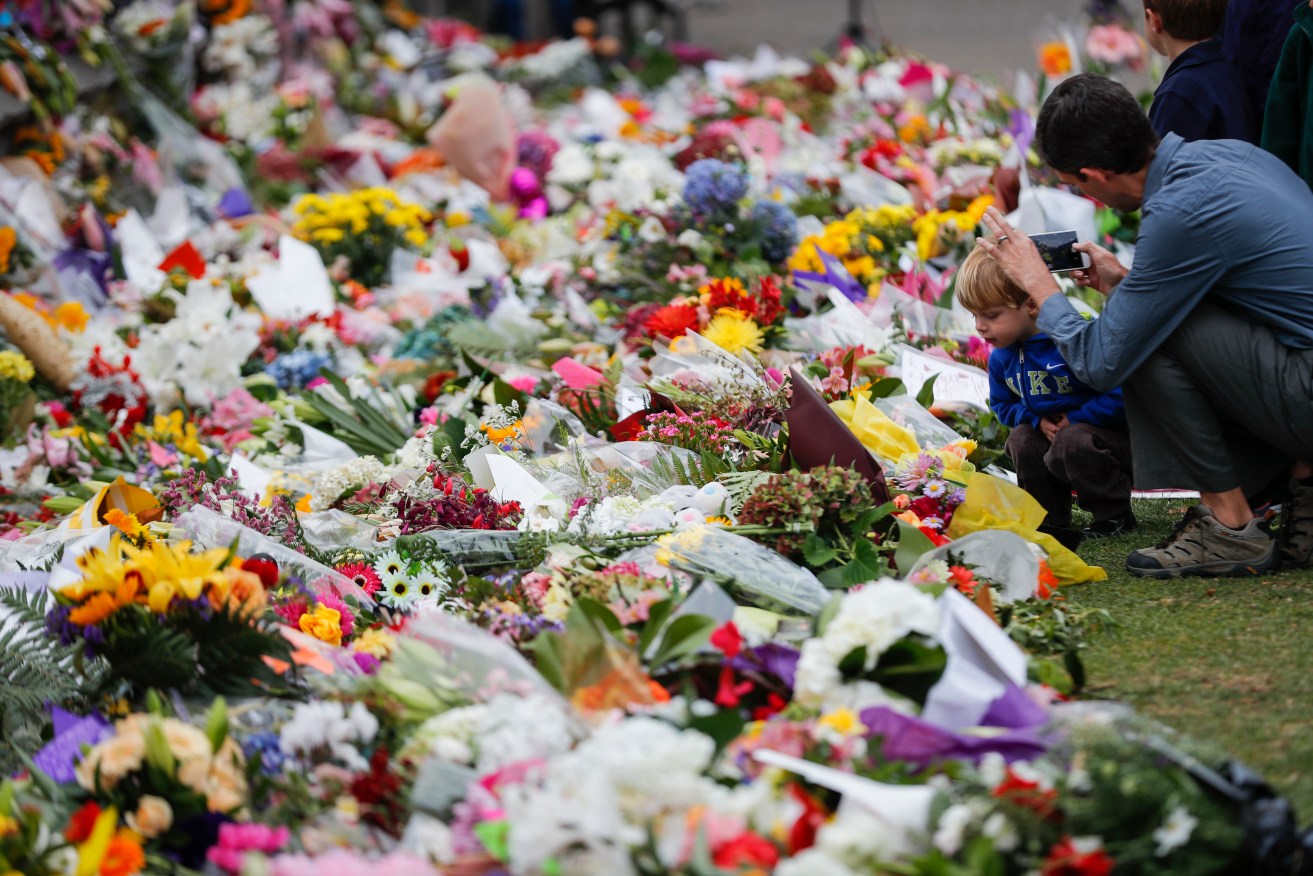 A floral tribute to victims of the Christchurch mosque shootings. Photo: AP/Vincent Thian