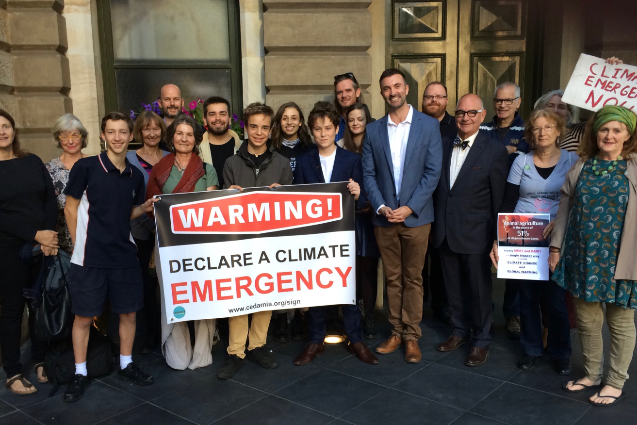 Area councillor Robert Simms (front right) rallied the city council to declare a "climate emergency" in March, but he was unsuccessful. Photo: Supplied