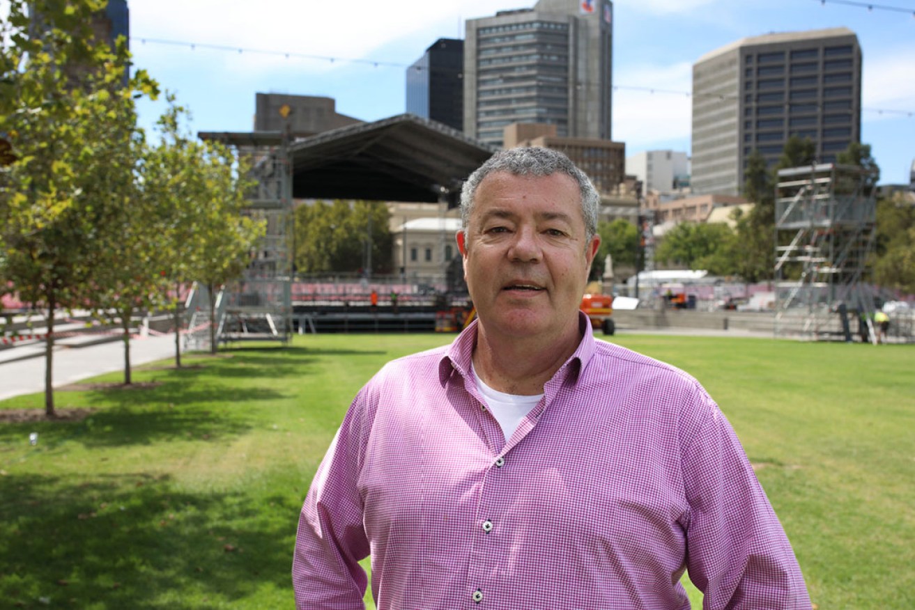 Stuart Maunder in Victoria Square, with the Carmen stage being built behind him. Photo: Tony Lewis / InDaily