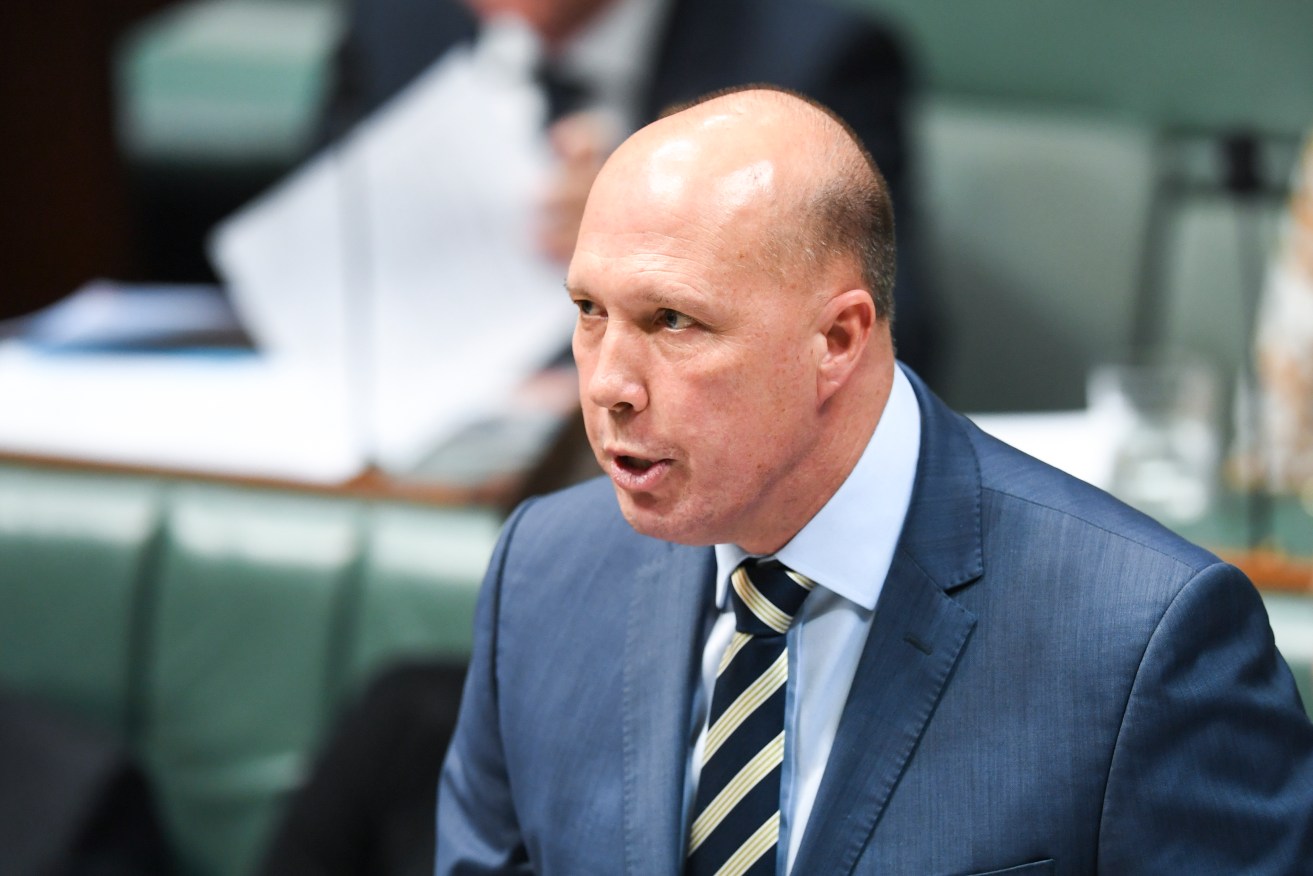 Peter Dutton says a lunch with a Chinese billionaire seeking Australian citizenship was above board. Photo: AAP/Lukas Coch