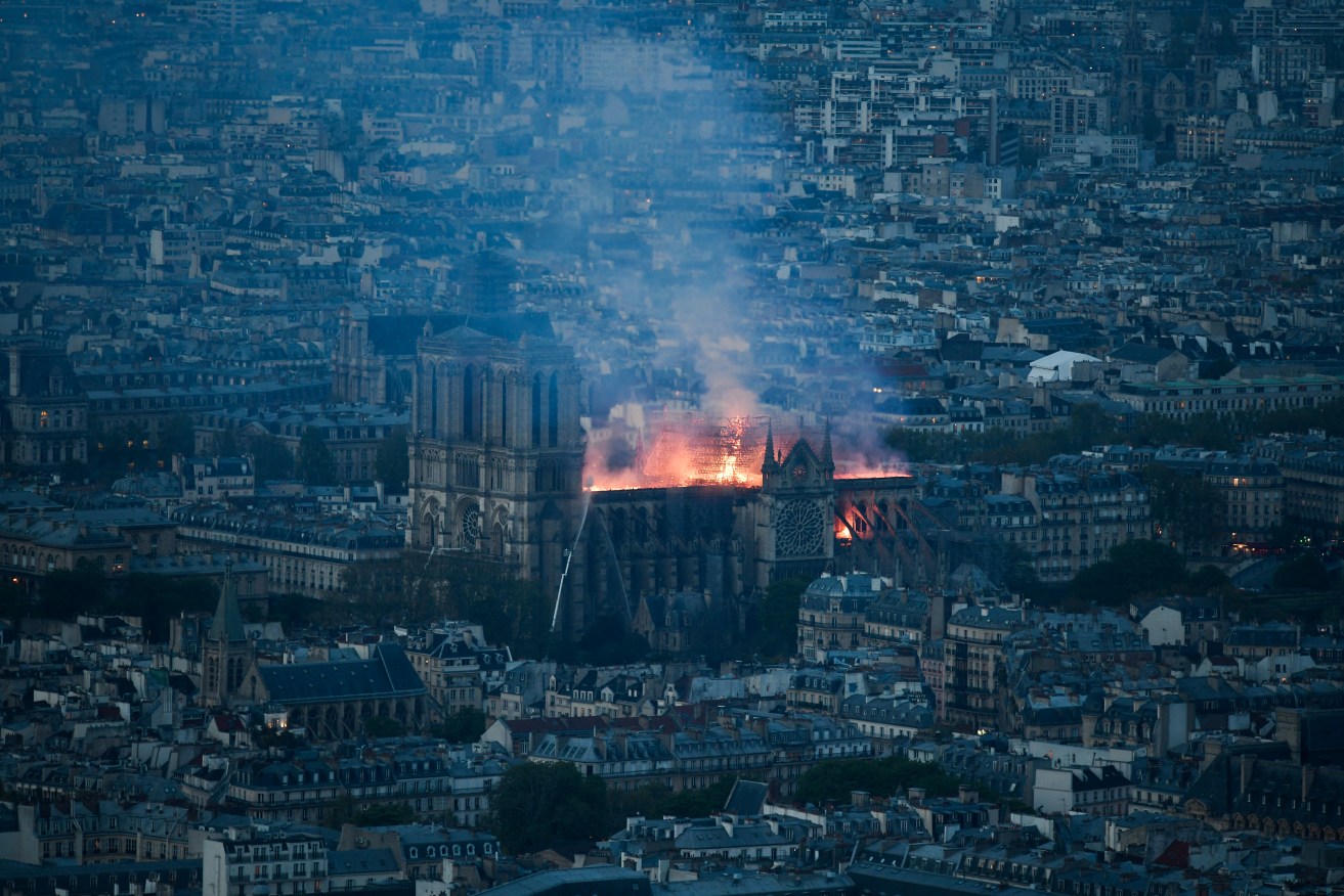 The spire of Notre-Dame Cathedral collapsed as fire took hold of the Paris landmark. Photo: Stephane Rochon Vollet