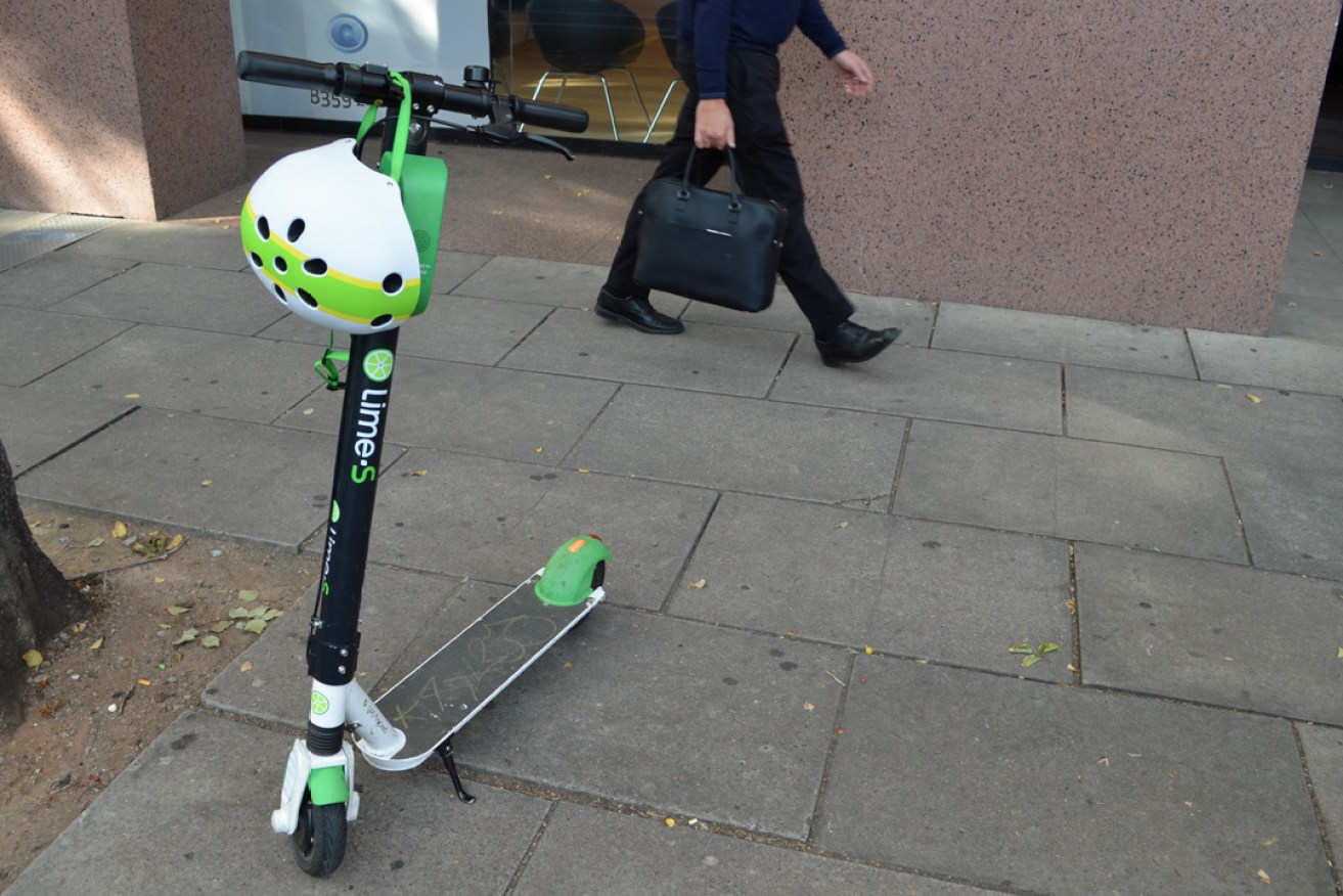 Lime e-scooters will soon be removed from Adelaide footpaths. Photo: InDaily / Bension Siebert