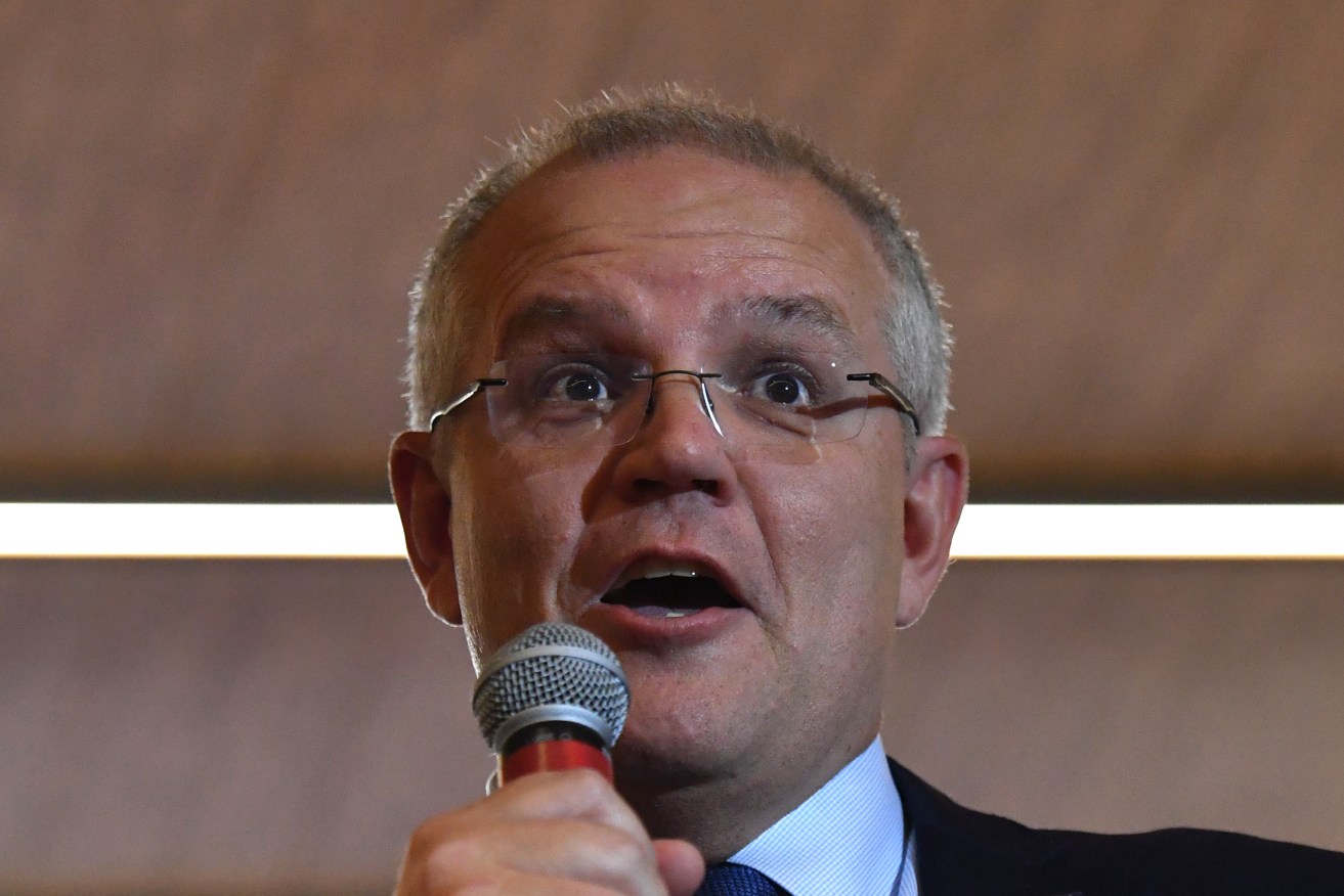 Polling shows the election race is tightening, but Scott Morrison and the Coalition remain behind Labor. Photo: AAP/Mick Tsikas