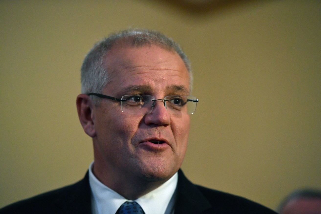 Scott Morrison is campaigning in Tasmania today with just three days left before the election. AAP/Mick Tsikas