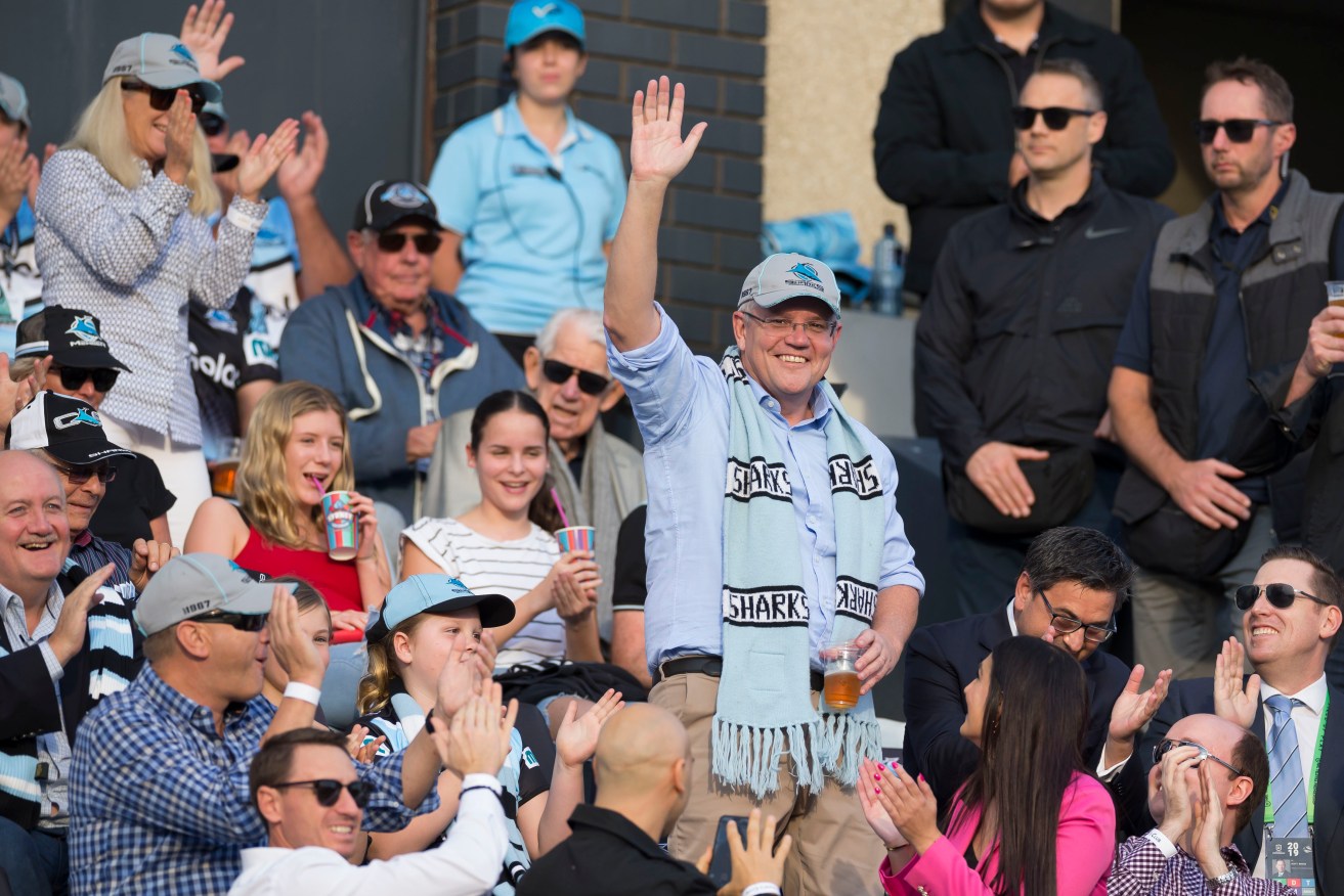 His beloved Cronulla Sharks may have lost yesterday, but Scott Morrison was looking very much the winner. Photo: Craig Golding / AAP