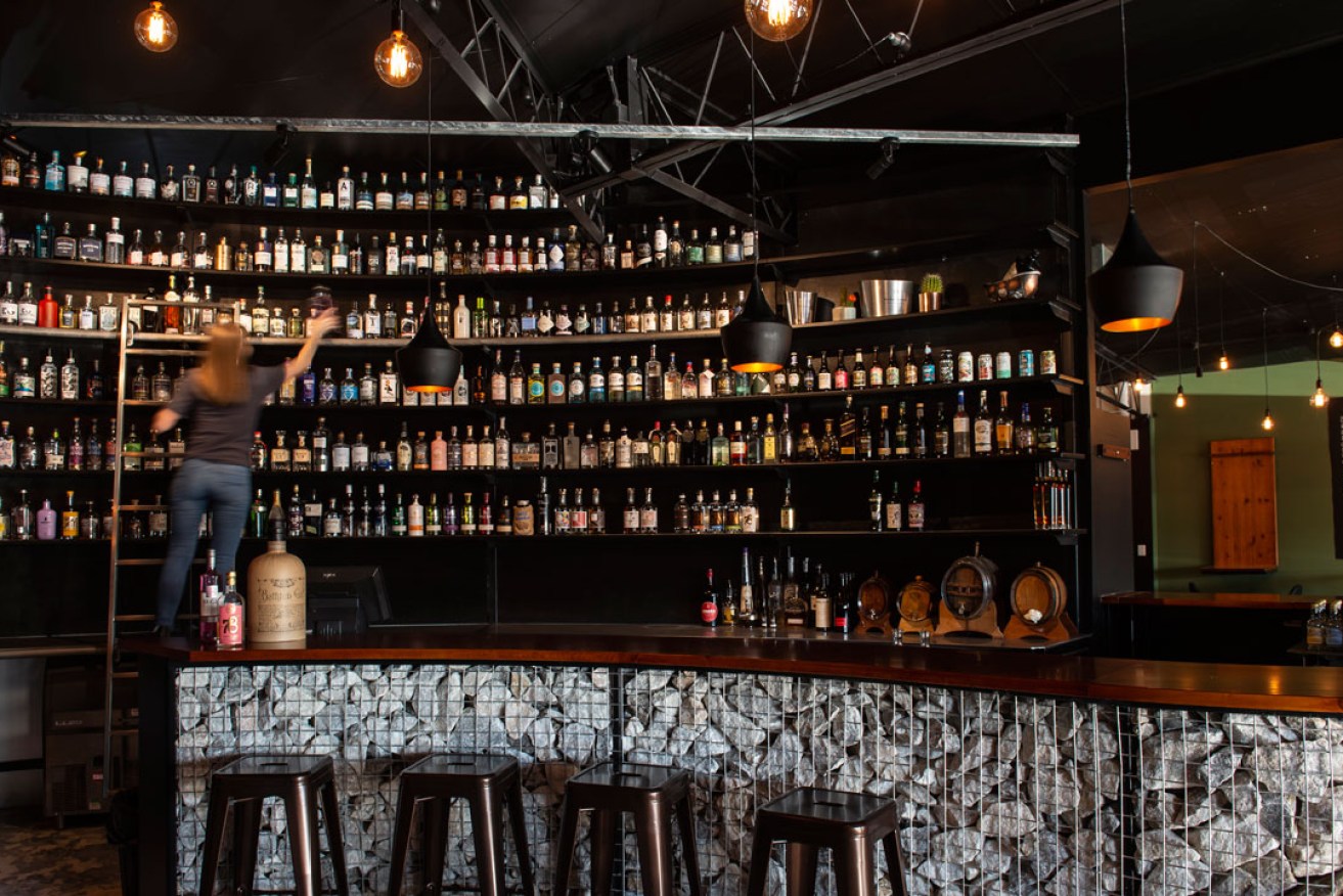 Musque's new bar features a wall of gin - and a ladder to reach it. Photo: What Pete Shot