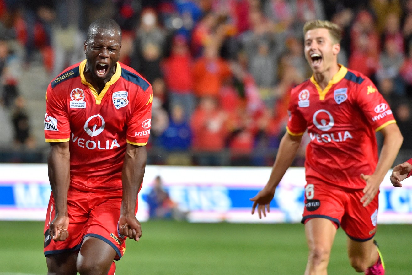 Bruce Djite (left): "My plea to the fans is to not let your support waver because I wouldn’t have come back to the club if I didn’t think it was heading in the right direction." Photo: AAP/David Mariuz