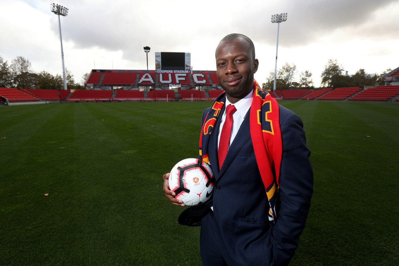 Former Adelaide United player turned football director Bruce Djite has detailed the club's recruiting approach. Photo: AAP/Kelly Barnes