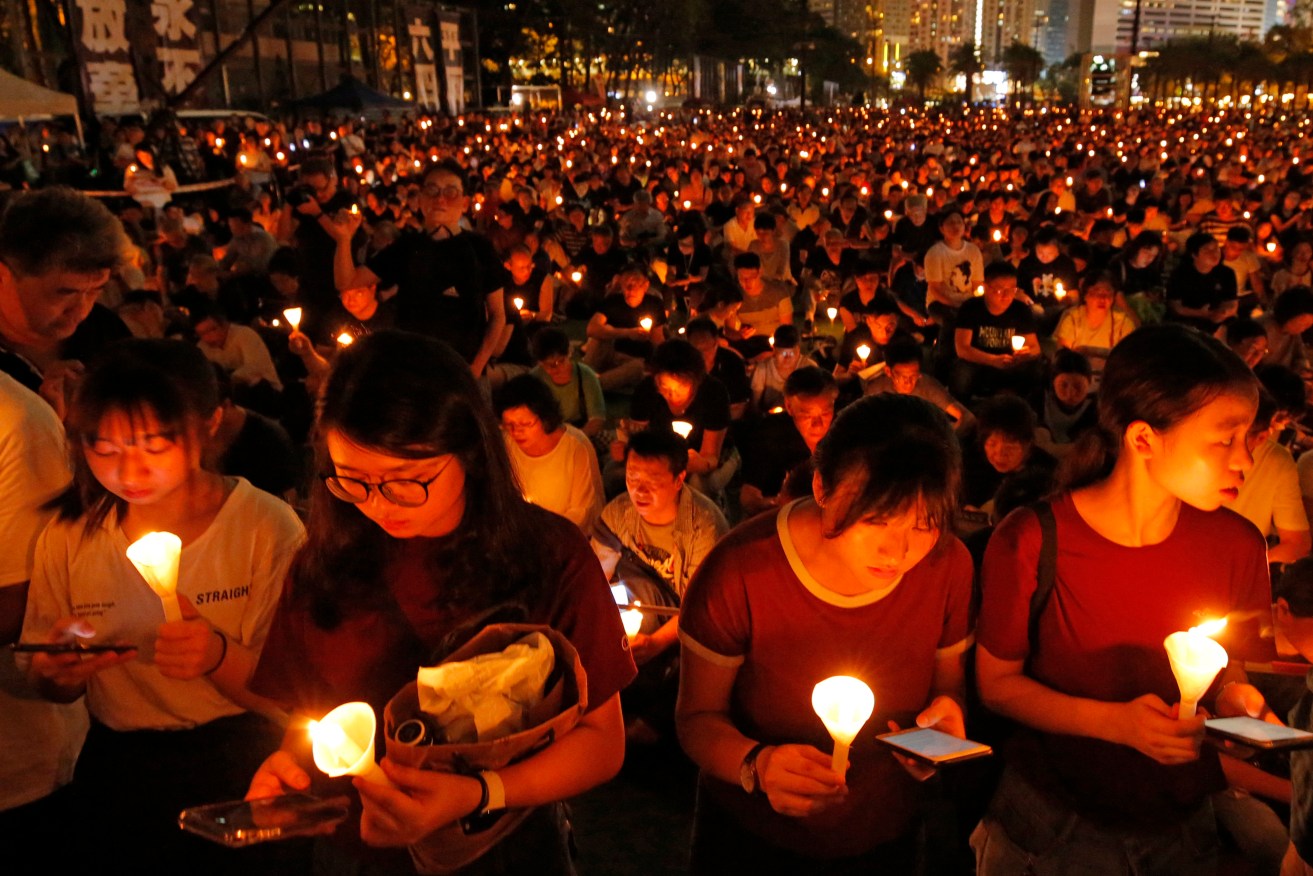 A Hong Kong candlelight vigil for victims of the 1989 military crackdown on protesters in Beijing's Tiananmen Square. Photo: AP/Kin Cheung