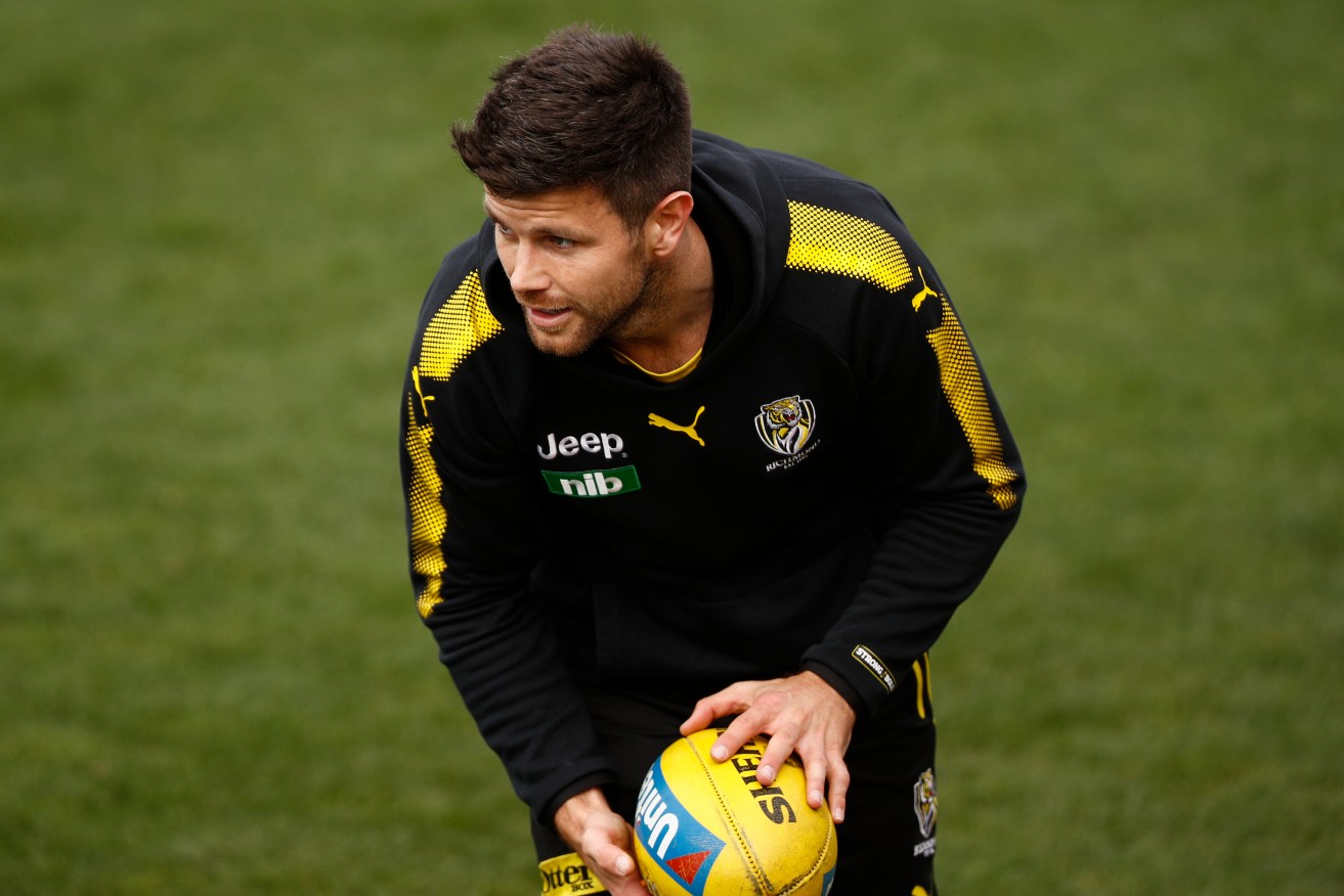 Richmond's Trent Cotchin is out for tomorrow night's Adelaide  Oval game. Photo: AAP/Daniel Pockett