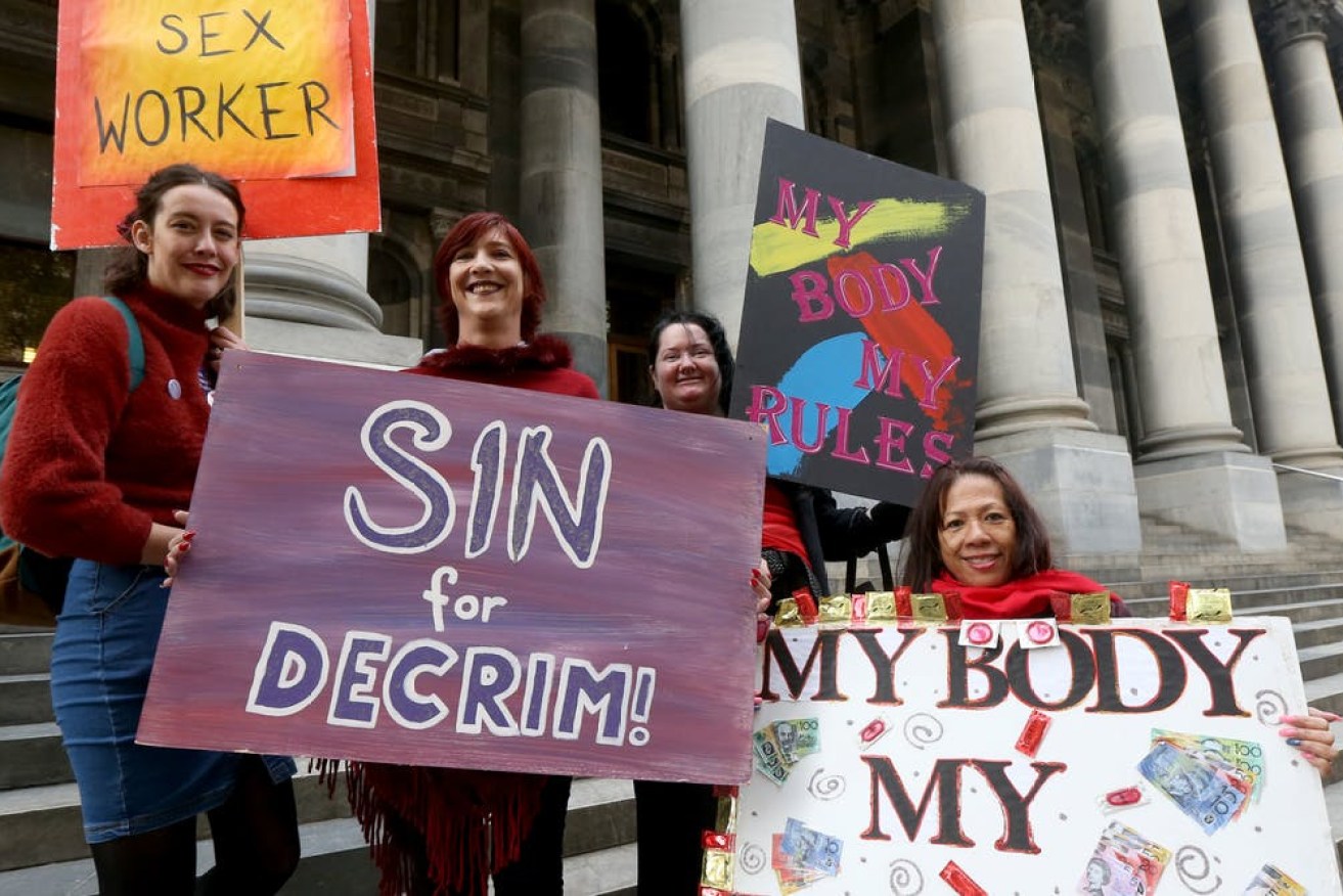 Members of the Sex Industry Network protest outside the South Australian Parliament, May 31 2019. AAP