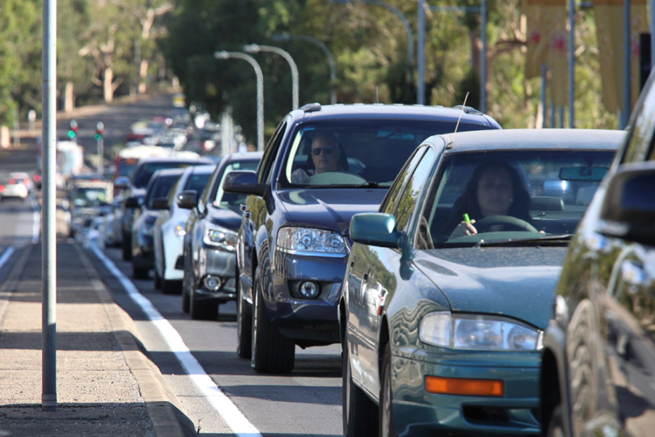 The Marshall Government says removing level crossings is part of congestion-busting infrastructure. Photo: Tony Lewis/InDaily