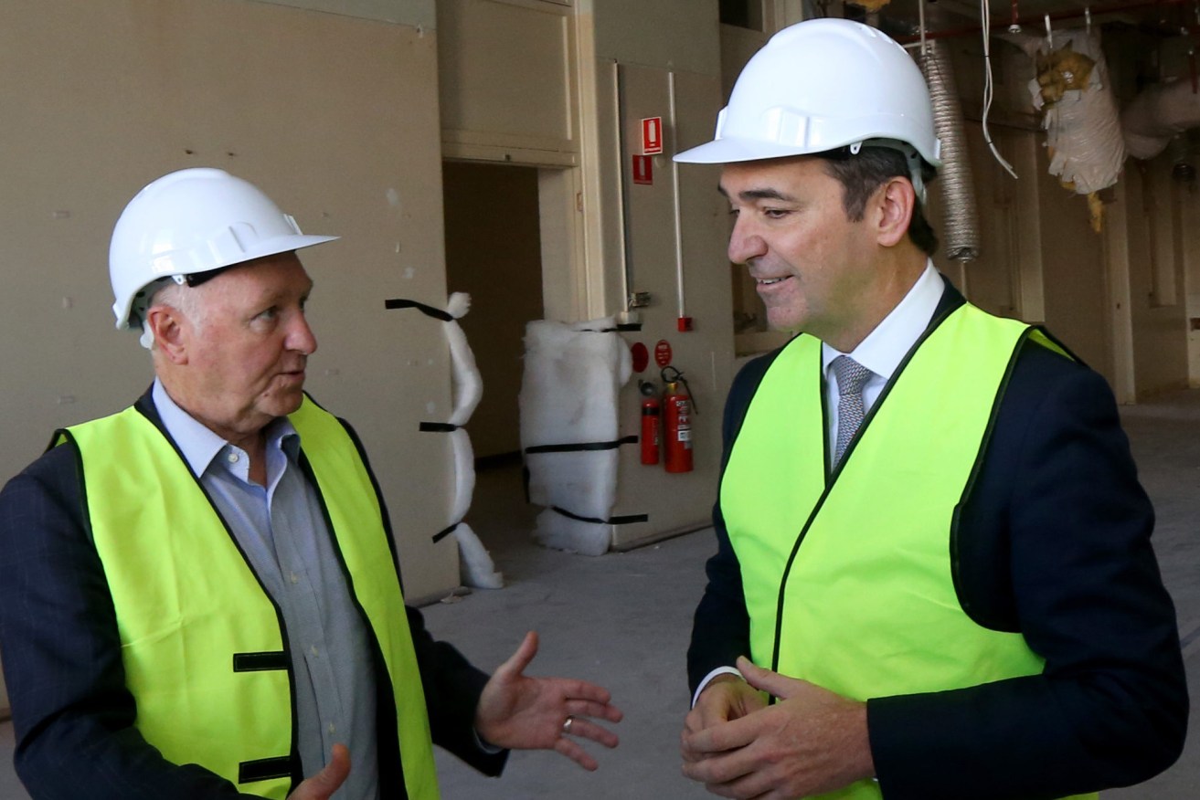 Premier Steven Marshall with then-CEO of Renewal SA John Hanlon at the Old Royal Adelaide Hospital site in May last year. Photo: Kelly Barnes / AAP