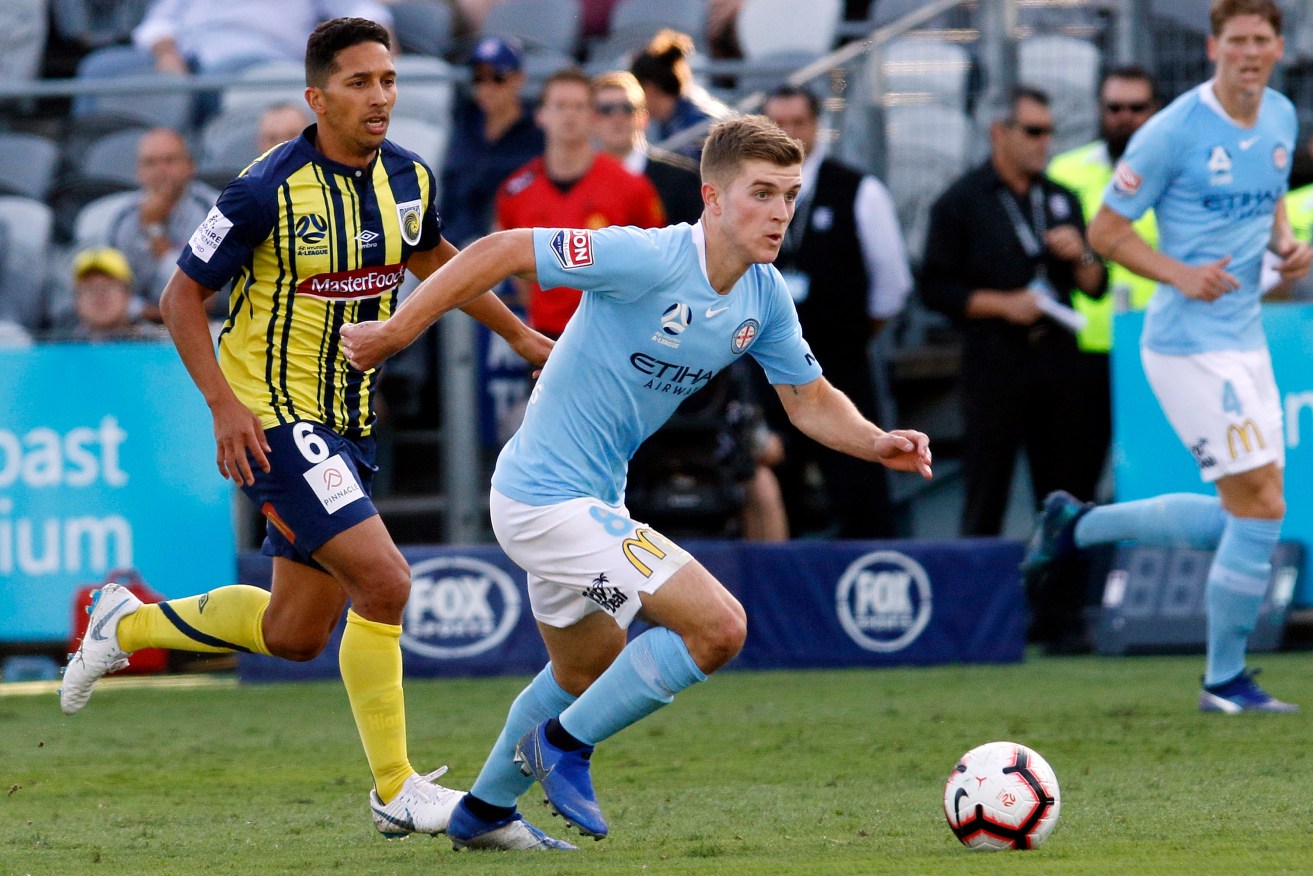 Adelaide United has paid a transfer fee to bring Riley McGree home from Belgium. Photo: AAP/Darren Pateman
