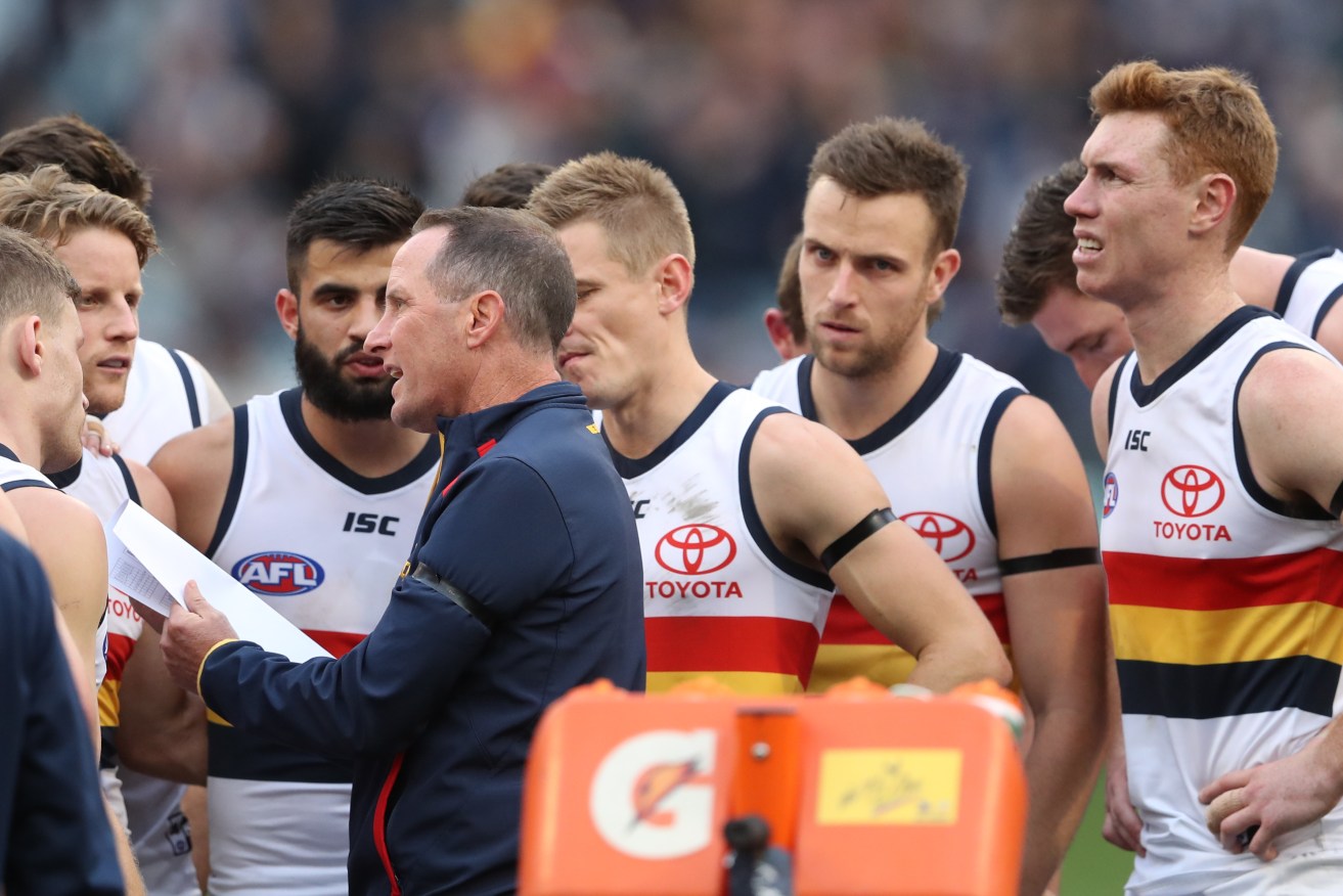 Don Pyke talks with his players during the loss to Carlton on the weekend. Photo: AAP/David Crosling