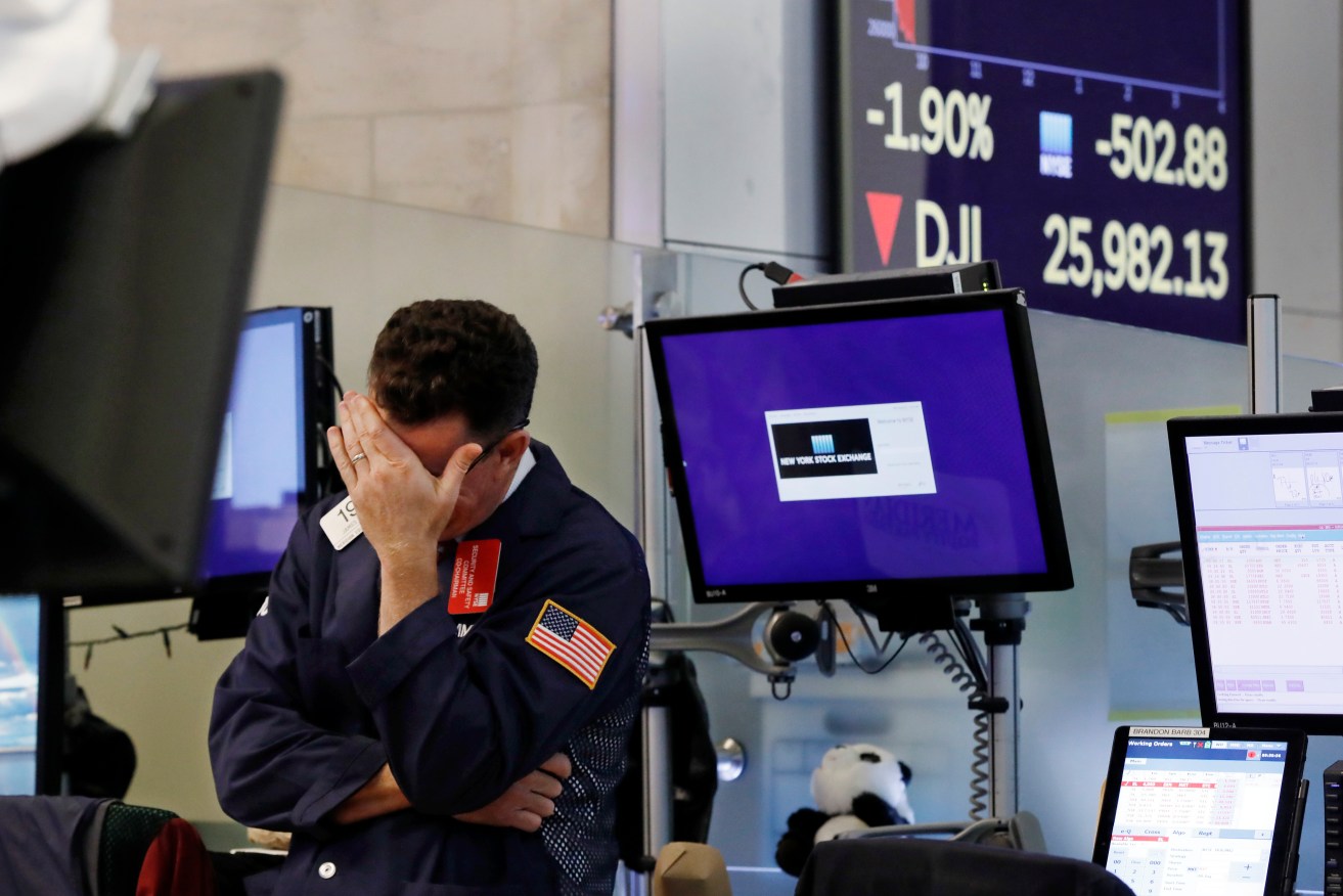 US and Australian stocks nosedived this week after China devalued the yuan, prompting US accusations of currency manipulation. Photo: AP/Richard Drew
