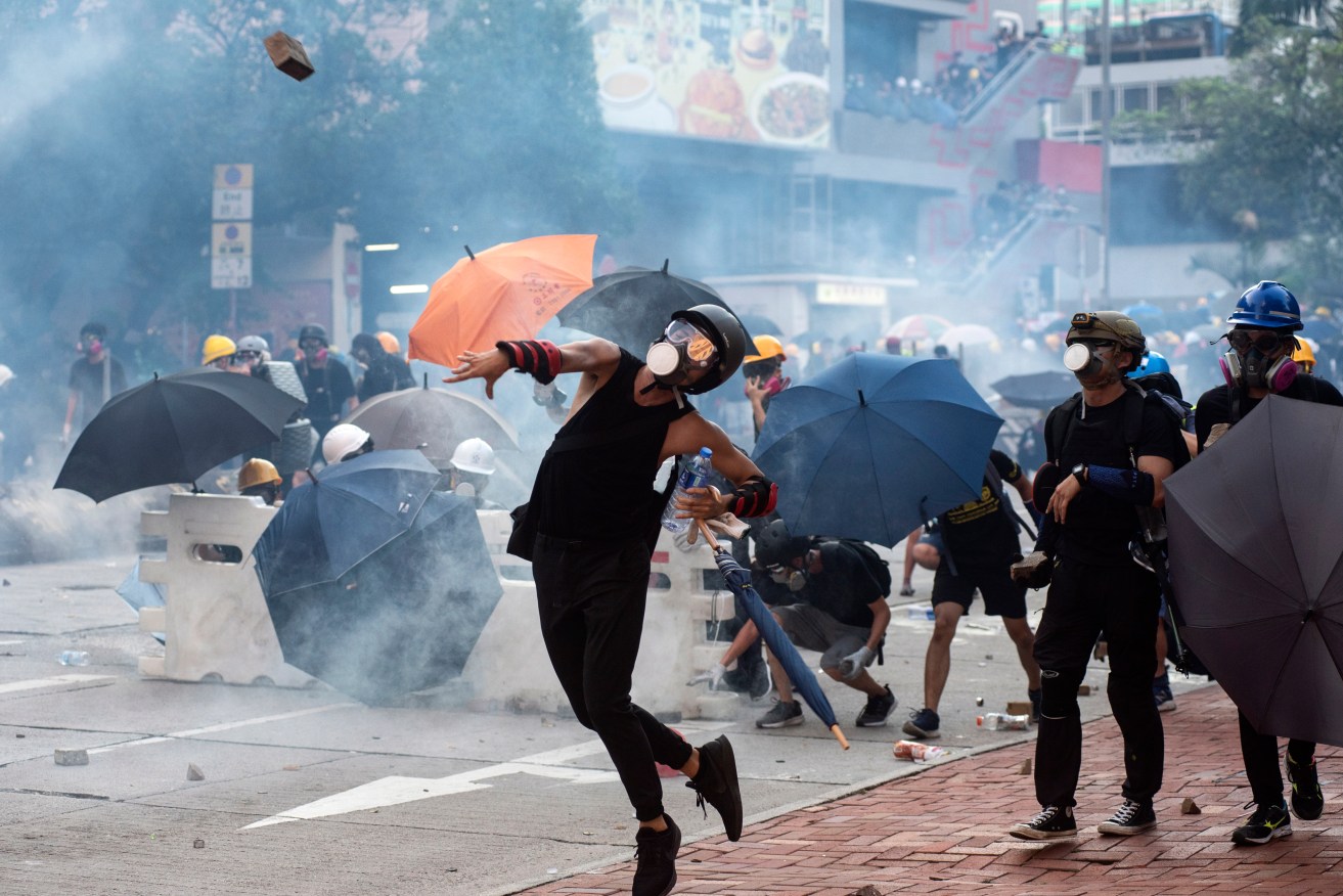 Protesters clash with police during a general strike after the ninth straight weekend of unrest. Photo: supplied